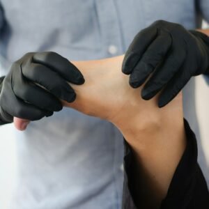 person massaging other person's foot